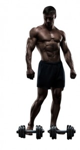 Man Standing Behind Dumbbells
